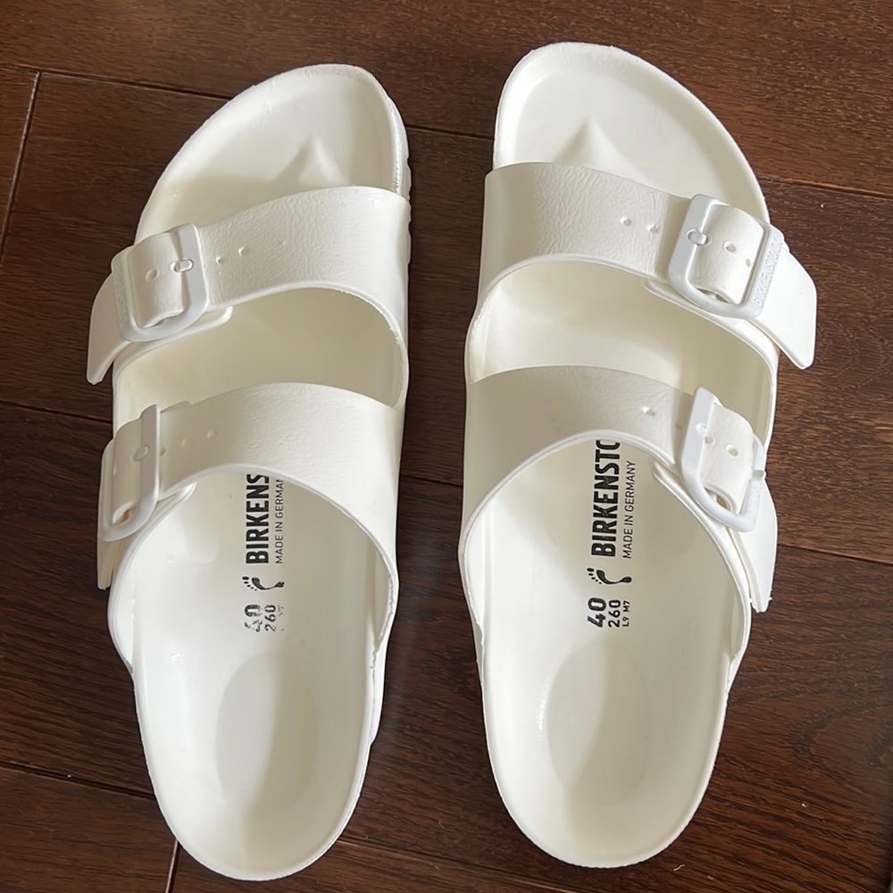 White Birkenstocks. Wore once but realized too big for me, basically new!
